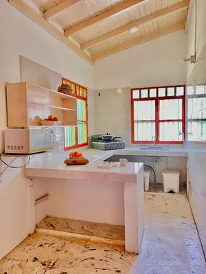 a kitchen with a counter in a room at Cerca a Coveñas- Cabaña El Paraiso - Mar - Arena in San Antero