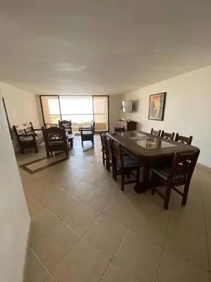 a dining room with a table and chairs at Cómodo y acogedor departamento in Cartagena de Indias