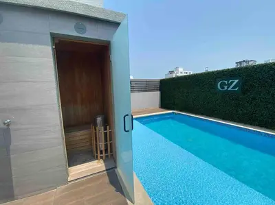 a swimming pool on the side of a building at Fantástico apartamento entero en el norte de la ciudad in Barranquilla