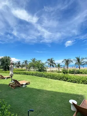a person standing in a park with a picnic table at Lujo y relax frente al mar en Morros Eos in Cartagena de Indias