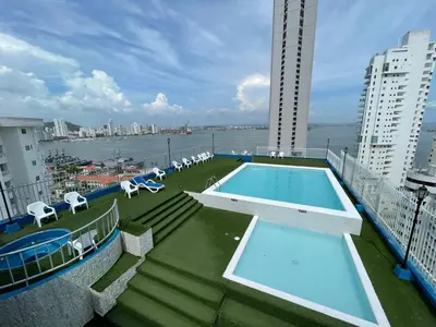 a swimming pool on the roof of a building at Portofino Bocagrande 3 habitaciónes in Cartagena de Indias