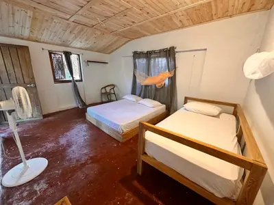 a bedroom with two beds in a room at Orika del Mar Hotel in Isla Grande