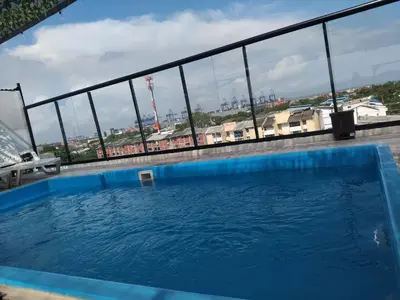 a swimming pool on the roof of a building at Hostel HA1 in Cartagena de Indias