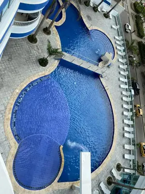 an overhead view of a large swimming pool at Apartamento Palmetto en Cartagena Vista al mar 702 in Cartagena de Indias