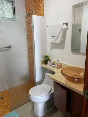 a bathroom with a toilet and a sink and a shower at Apartamento Palmetto en Cartagena Vista al mar 702 in Cartagena de Indias