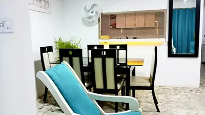a dining room with a table and chairs at Casa Esmeralda in Cartagena de Indias
