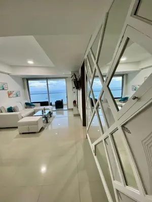 a living room with a view of the ocean at Palmetto elíptic apto 3302 vista al mar in Cartagena de Indias