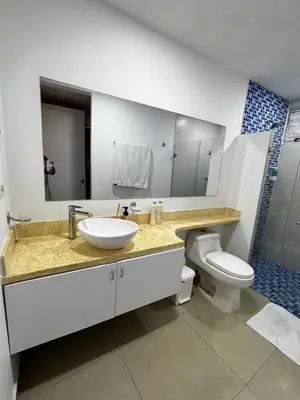 a bathroom with a sink and a toilet at Alojamiento Cartagena frente Al Mar in Cartagena de Indias