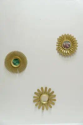 three objects on the ceiling of a room at MANGO BiCHE - HOUSE in Cartagena de Indias