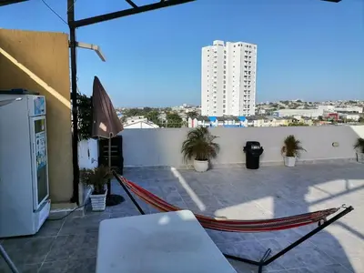 a balcony with a view of a building at Hostel AC in Cartagena de Indias