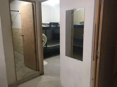 a room with a door and a mirror in a room at apartamento san antero in San Antero