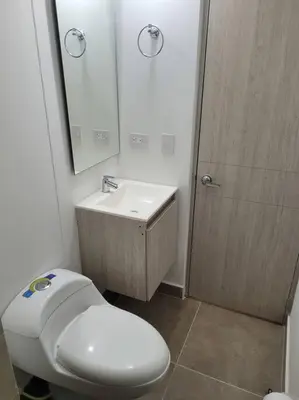 a bathroom with a toilet and a sink and a mirror at Refugio de ensueño in Manzanillo del Mar