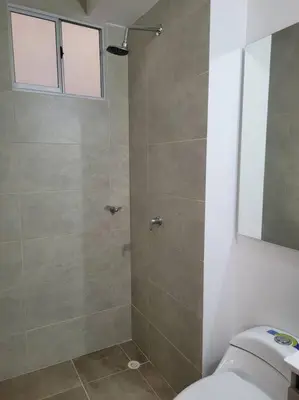 a bathroom with a shower with a toilet and a sink at Refugio de ensueño in Manzanillo del Mar