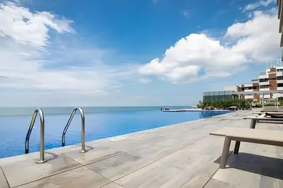 a view of the ocean from a hotel patio at Luxury H2 piso 19 / Sea Bay View & Historic Center in Cartagena de Indias