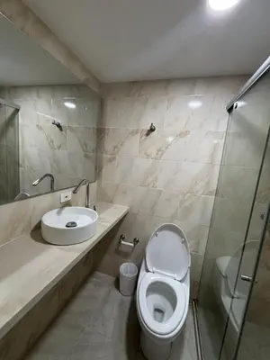 a bathroom with a toilet and a sink at Apartamento Económico En Coveñas in Coveñas