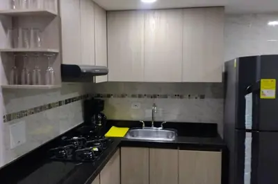 a kitchen with a sink and a counter top at CARTAGENA CONFORT APARTAMENTO NUEVO y COMPLETO in Cartagena de Indias