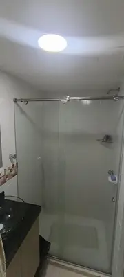 a shower with a glass door in a bathroom at CARTAGENA CONFORT APARTAMENTO NUEVO y COMPLETO in Cartagena de Indias