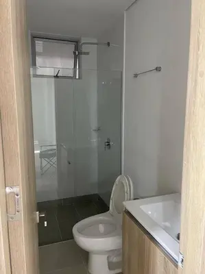 a bathroom with a shower and a toilet and a sink at Apto playa Alojamiento en Cartagena in Cartagena de Indias