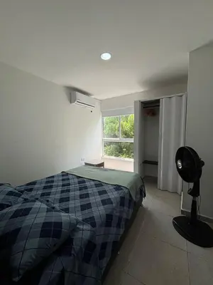 a bedroom with a bed and a window at Apartamento 2 habitaciones Paraiso, by Accommdo360 in Barranquilla