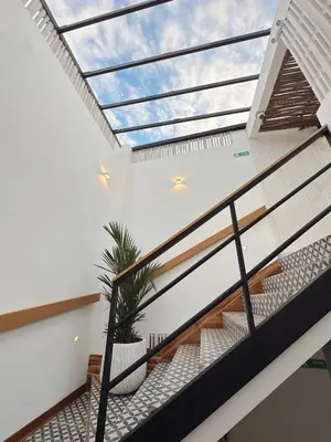 an open stairwell with a skylight in a house at Casa Bugó Arsenal Hotel Boutique en Getsemaní in Cartagena de Indias