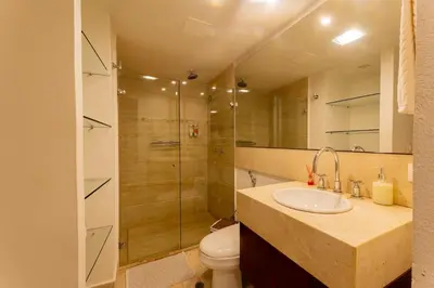 a bathroom with a sink and a toilet and a shower at Luxury Colonial Home at Virrey Eslava in Cartagena de Indias
