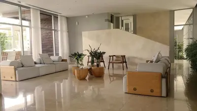 a living room with couches and a table and chairs at Apartamento Cartagena in Cartagena de Indias