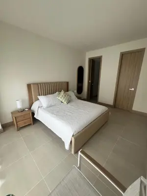 a bedroom with a large bed and a tiled floor at Apartamento en Cartagena in Cartagena de Indias