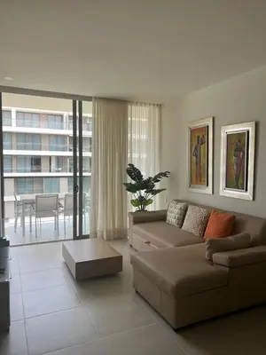 a living room with a couch and a table at Apartamento en Cartagena in Cartagena de Indias