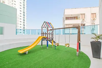 a playground on the roof of a building with a slide at Vista de lujo al mar y la bahía in Cartagena de Indias