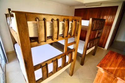 a pair of bunk beds in a room at Te la mereces, frente al mar in Cartagena de Indias