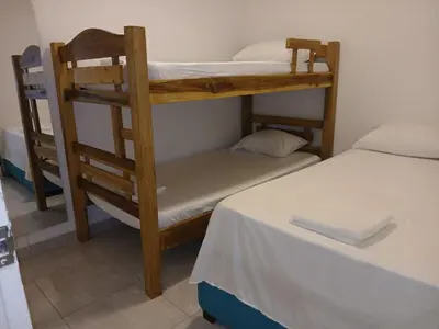 a couple of bunk beds in a room at Casa Marbella in Cartagena de Indias