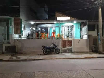 a motorcycle parked in front of a building at Sharly House in Cartagena de Indias