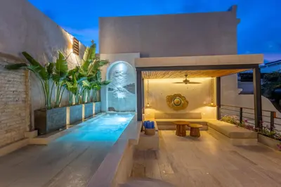 a house with a swimming pool and a patio at Casa Fernandez By SoHo in Cartagena de Indias