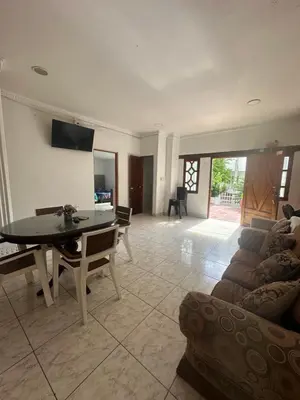 a living room with a couch and a table at Casona La Española in Cartagena de Indias