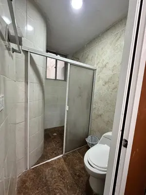 a bathroom with a toilet and a shower stall at Casona La Española in Cartagena de Indias