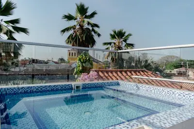 a swimming pool on the roof of a building at Casa Guerrero in Cartagena de Indias