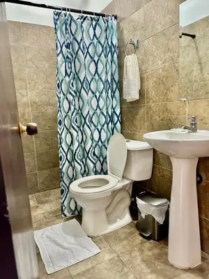 a bathroom with a toilet and a sink at Casa Centro Historico Hotel in Cartagena de Indias