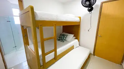 a couple of bunk beds in a room at Hermoso Apartamento Frente al Mar 2 Habitaciones B12A in Coveñas