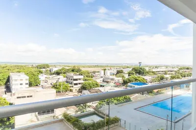 a view of the city from the balcony of a building at Hermoso moderno y comodo Cartagena Beach CB741 in Cartagena de Indias