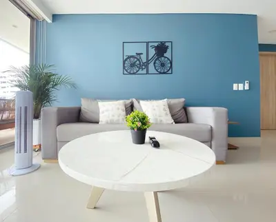 a living room with a white table and a couch at Melodias de Verano in Cartagena de Indias