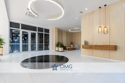 an empty lobby of an office building with a large ceiling at CB 1002 | Suite moderna con vista al mar infinita in Cartagena de Indias