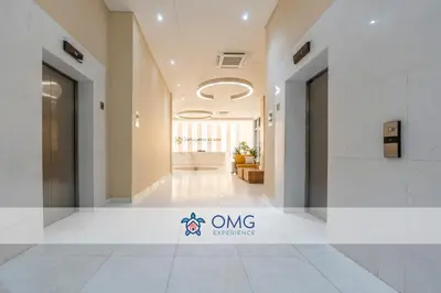 an empty hallway of a hospital with a sign on the floor at CB1204 | Suite minimalista frente al mar y atardeceres in Cartagena de Indias
