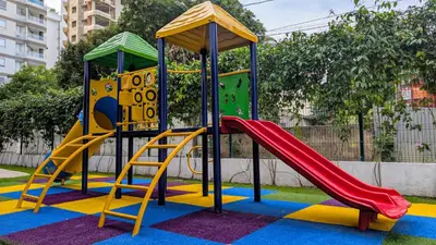 a playground with a slide and a slideintend at Piscinas con vista increible, bar, música y playa in Cartagena de Indias