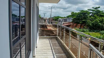 a balcony with a view of a train yard at Charles gomez in Cartagena de Indias
