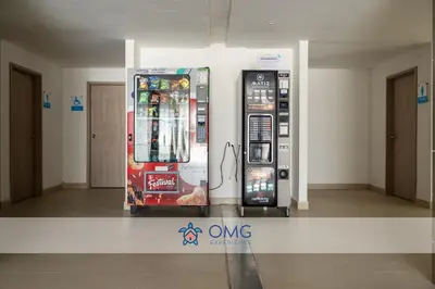 two vending machines are standing next to each other at Apartamento ideal para familias y trabajo CB931 in Cartagena de Indias