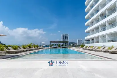 a swimming pool in the middle of a building at CB937 | Stylish loft piso 9 con balcón y vista ciudad in Cartagena de Indias