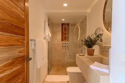 a bathroom with a shower and a toilet at Islawa Soy Local - Isla Privada in Baru