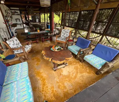 an aerial view of a living room with chairs and a table at Cabaña Azores, Barú, Cartagena in Baru