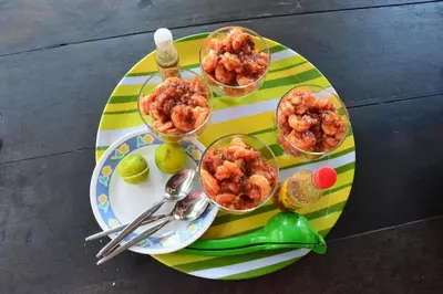 a table with dishes of food on a plate at Cabaña Azores, Barú, Cartagena in Baru