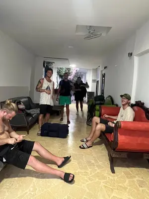 a group of people sitting in a living room at Casa Torices Real 12 in Cartagena de Indias